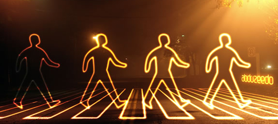 glowing people in crosswalk