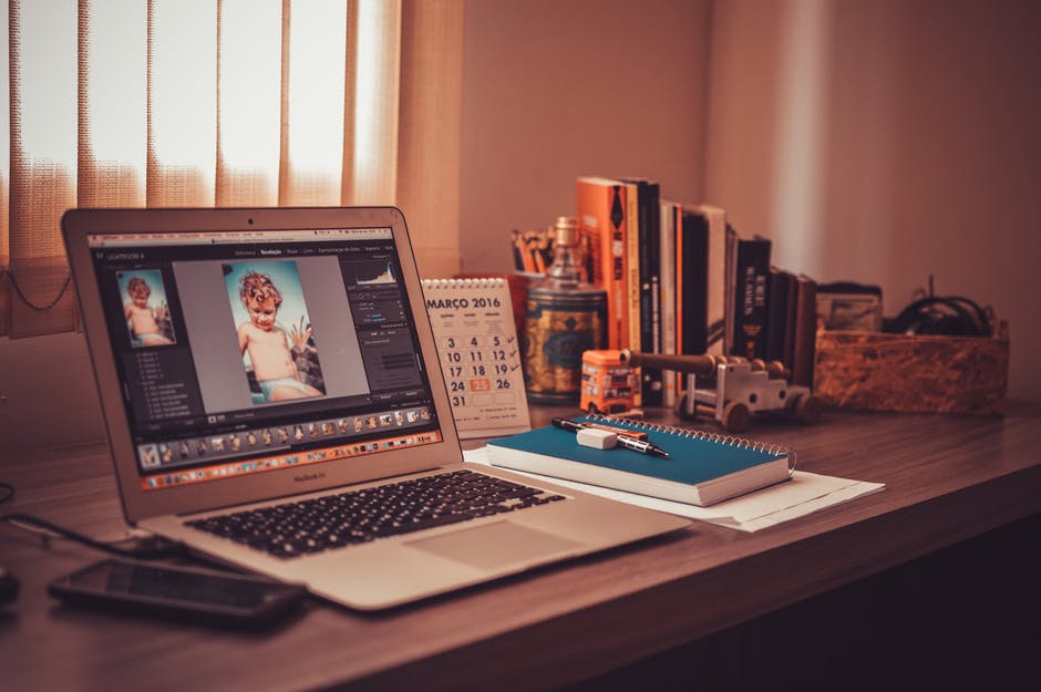 Photoshopping Portraits on a Laptop