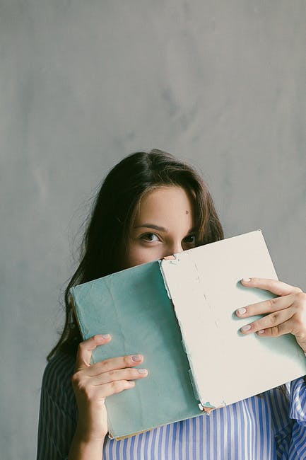 Woman Holding a Book